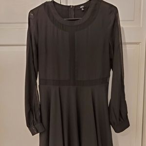 Black dress with see-through panels